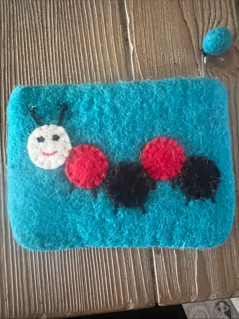 Blue Felt Wallet with Playful Caterpillar Motif